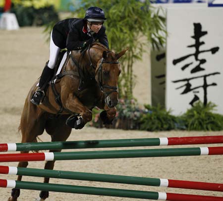 British rider Sharon Hunt riding horse Tankers Town jumps over an obstacle during eventing jumping competition of the Beijing 2008 Olympic Games equestrian events in the Olympic co-host city of Hong Kong, south China, Aug. 12, 2008. The team of Great Britain won the bronze medal of eventing team with a total penalty of 185.70.