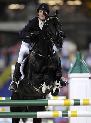 Australian rider Sonja Johnson riding horse Ringwould Jaguar jumps during eventing jumping competition of the Beijing 2008 Olympic Games equestrian events at the Hong Kong Olympic Equestrian Venue (Sha Tin) in the Olympic co-host city of Hong Kong, south China, Aug. 12, 2008. The team of Australia won the silver medal of eventing team with a total penalty of 171.20. (Xinhua/Lui Siu Wai)