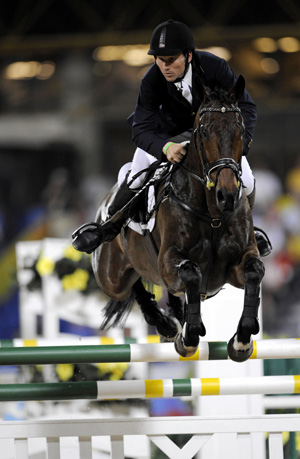  Australian rider Shane Rose riding horse All Luck jumps during eventing jumping competition of the Beijing 2008 Olympic Games equestrian events at Hong Kong Olympic Equestrian Venue (Sha Tin) in the Olympic co-host city of Hong Kong, south China, Aug. 12, 2008. The team of Australia won the silver medal of eventing team with a total penalty of 171.20. (Xinhua/Lui Siu Wai)