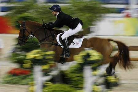 British rider Sharon Hunt riding horse Tankers Town jumps over an obstacle during eventing jumping competition of the Beijing 2008 Olympic Games equestrian events in the Olympic co-host city of Hong Kong, south China, Aug. 12, 2008. 