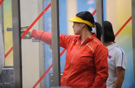 Chen Ying of China competes during the women's 25m pistol final of the Beijing 2008 Olympic Games shooting event at the Beijing Shooting Range Hall in Beijing, China, Aug. 13, 2008. Chen Ying shot 793.4 points to win the gold medal of the event. [Xinhua] 