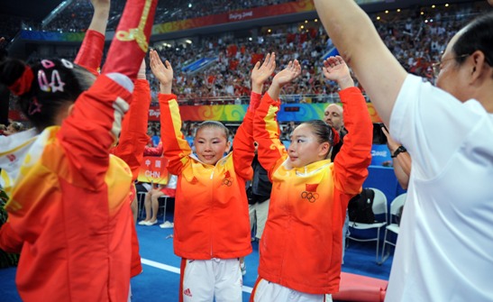 The Chinese women gymnasts won their first ever Olympic team gold in Wednesday's final of the Beijing Olympic Games, making a historic breakthrough expected by China for decades. With deafening hail and applause, Cheng Fei finished her routine in the last event of floor exercise and scored 15.450 points, bringing the gold to the host country which accumulated a winning total of 188.900 points [Xinhua]