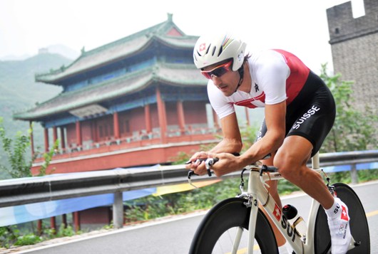 Fabian Cancellara of Switzerland powered to the gold medal in the Men's Individual Time Trial as he lived up to his pre-race favorite status Wednesday on a grueling, two-lap 47.3km course. The two-time defending world Time Trial champion fended off a strong challenge from silver medalist Gustav Larsson of Sweden to become Switzerland's first Olympic Time Trial champion. Levi Leipheimer of the United States won bronze. [Xinhua]