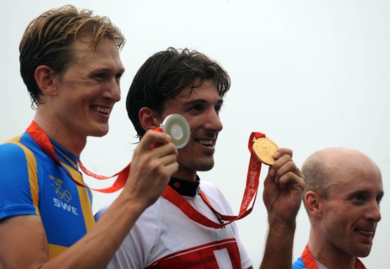 Fabian Cancellara of Switzerland powered to the gold medal in the Men's Individual Time Trial as he lived up to his pre-race favorite status Wednesday on a grueling, two-lap 47.3km course. The two-time defending world Time Trial champion fended off a strong challenge from silver medalist Gustav Larsson of Sweden to become Switzerland's first Olympic Time Trial champion. Levi Leipheimer of the United States won bronze. [Xinhua]