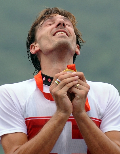 Fabian Cancellara of Switzerland powered to the gold medal in the Men's Individual Time Trial as he lived up to his pre-race favorite status Wednesday on a grueling, two-lap 47.3km course. The two-time defending world Time Trial champion fended off a strong challenge from silver medalist Gustav Larsson of Sweden to become Switzerland's first Olympic Time Trial champion. Levi Leipheimer of the United States won bronze. [Xinhua]