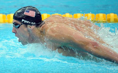 Phelps wins men's 200m butterfly gold in world record time