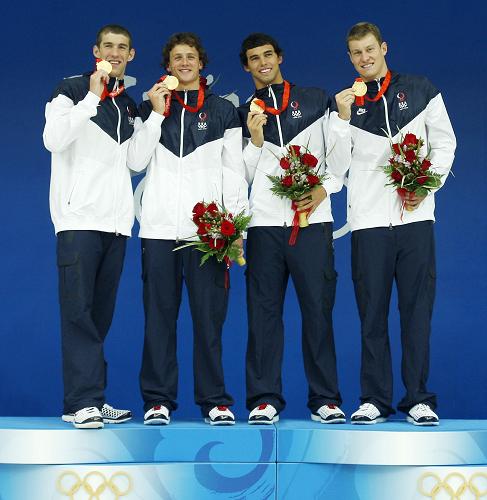 The American quartet of Phelps, Ryan Lochte, Ricky Berens and Peter Vanderkaay beat their own world record by 4.68 seconds to clock six minutes and 58.56 seconds.