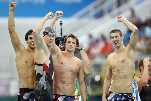 The American quartet of Phelps, Ryan Lochte, Ricky Berens and Peter Vanderkaay beat their own world record by 4.68 seconds to clock six minutes and 58.56 seconds.