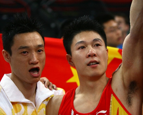 Li Xiaopeng (R) and Yang Wei 