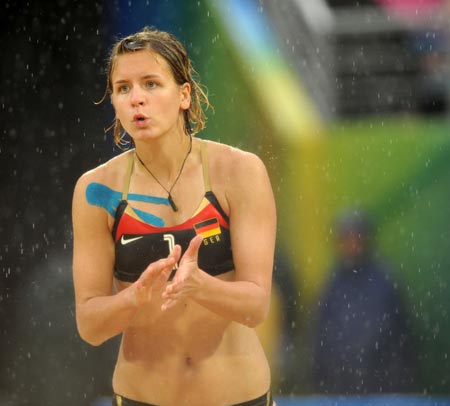 Laura Ludwig of Germany reacts during the women's preliminary pool D match against Efthalia Koutroumanidou and Maria Tsiartsiani of Greece at the Beijing 2008 Olympic Games beach volleyball event in Beijing, China, Aug. 14, 2008. Laura Ludwig and Sara Goller of Germany beat Efthalia Koutroumanidou and Maria Tsiartsiani of Greece 2-0.