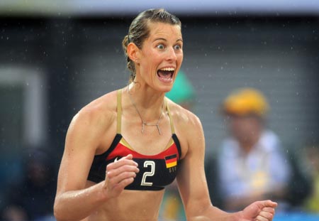 Sara Goller of Germany celebrates during the women's preliminary pool D match against Efthalia Koutroumanidou and Maria Tsiartsiani of Greece at the Beijing 2008 Olympic Games beach volleyball event in Beijing, China, Aug. 14, 2008. Laura Ludwig and Sara Goller of Germany beat Efthalia Koutroumanidou and Maria Tsiartsiani of Greece 2-0. 