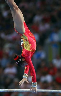 He Kexin performs at the women's gymnastics team final at the Beijing Olympics yesterday.