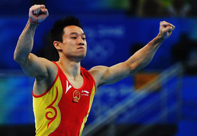 Chinese Yang Wei wins men's individual all-around gymnastics Olympic gold. 