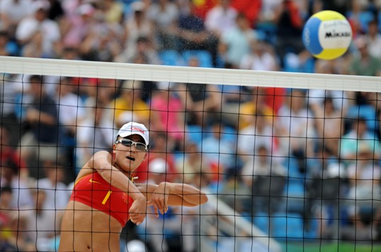 Chinese beach volleyball women duo Zhang Xi/Xue Chen remained unbeaten on August 14, as their compatriots Tian Jia/Wang Jie did on the previous day of the Beijing Olympic Games. In their third preliminary in women's group D, Zhang/Xue won over South African pair Judith Deister Augoustides/Vitalila Nel comfortably, downing the visitors in two sets (21-13, 21-9). The South African duo, defeated for the third time in preliminary round, was out. [Xinhua]