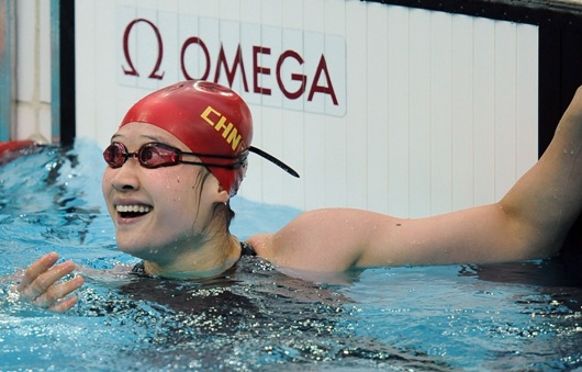 China's Liu Zige smashed Australian swimmer Jessicah Schipper's world record in women's 200-meter butterfly on August 14, pocketing host China's first swimming gold at the Beijing Olympic Games. Schipper led the race in the first 100 meters, but the 20-year-old Liu managed to overtake her after the final turn and stormed to finish in two minutes 04.18 seconds. Liu's teammate Jiao Liuyang also managed to beat Schipper in the last meters, taking silver in 2:05.40. Schipper was third in 2:06.26. [Xinhua]