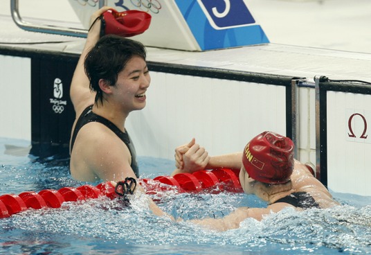 China's Liu Zige smashed Australian swimmer Jessicah Schipper's world record in women's 200-meter butterfly on August 14, pocketing host China's first swimming gold at the Beijing Olympic Games. Schipper led the race in the first 100 meters, but the 20-year-old Liu managed to overtake her after the final turn and stormed to finish in two minutes 04.18 seconds. Liu's teammate Jiao Liuyang also managed to beat Schipper in the last meters, taking silver in 2:05.40. Schipper was third in 2:06.26. [Xinhua]