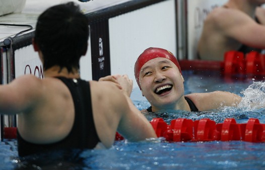 China's Liu Zige smashed Australian swimmer Jessicah Schipper's world record in women's 200-meter butterfly on August 14, pocketing host China's first swimming gold at the Beijing Olympic Games. Schipper led the race in the first 100 meters, but the 20-year-old Liu managed to overtake her after the final turn and stormed to finish in two minutes 04.18 seconds. Liu's teammate Jiao Liuyang also managed to beat Schipper in the last meters, taking silver in 2:05.40. Schipper was third in 2:06.26. [Xinhua]