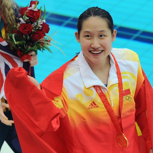 China's Liu Zige smashed Australian swimmer Jessicah Schipper's world record in women's 200-meter butterfly on August 14, pocketing host China's first swimming gold at the Beijing Olympic Games. Schipper led the race in the first 100 meters, but the 20-year-old Liu managed to overtake her after the final turn and stormed to finish in two minutes 04.18 seconds. Liu's teammate Jiao Liuyang also managed to beat Schipper in the last meters, taking silver in 2:05.40. Schipper was third in 2:06.26. [Xinhua]