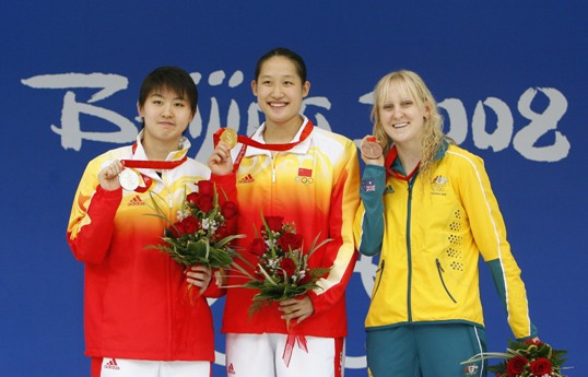 China's Liu Zige smashed Australian swimmer Jessicah Schipper's world record in women's 200-meter butterfly on August 14, pocketing host China's first swimming gold at the Beijing Olympic Games. Schipper led the race in the first 100 meters, but the 20-year-old Liu managed to overtake her after the final turn and stormed to finish in two minutes 04.18 seconds. Liu's teammate Jiao Liuyang also managed to beat Schipper in the last meters, taking silver in 2:05.40. Schipper was third in 2:06.26. [Xinhua]