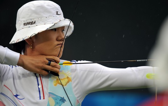 Chinese Zhang Juanjuan beat South Korean Park Sung-Hyun 110-109 to win the women's individual archery gold medal at the Olympic Games in Beijing on August 14. South Korean Yun Ok-hee downed DPR Korean Kwon Un-sil 109-106 for the bronze medal. [Xinhua]
