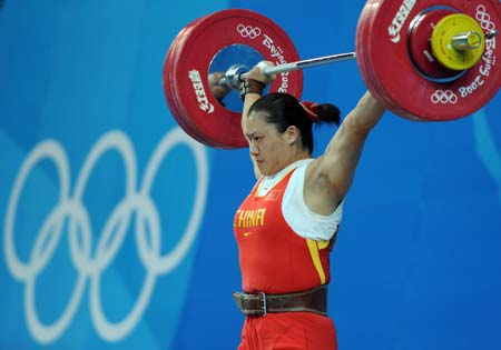 Cao Lei of China tries a lift during women's 75kg group A competition of the Beijing 2008 Olympic Games weightlifting event in Beijing, China, Aug. 15, 2008. Cao Lei set the new Olympic record of women's 75kg snatch with 128 kg.
