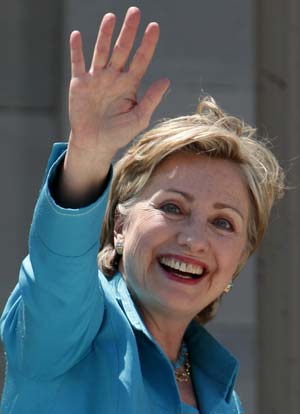 Former Democratic presidential candidate US Senator Hillary Clinton (D-NY) waves as she arrives on Capitol Hill in Washington, June 24, 2008. (Xinhua/Reuters Photo) 