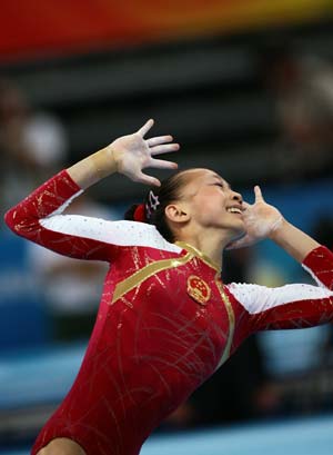 China&apos;s Yang Yilin performs on the floor during gymnastics artistic women&apos;s individual all-round final of Beijing 2008 Olympic Games at National Indoor Stadium in Beijing, China, Aug. 15, 2008. Yang Yilin won the bronze with a score of 62.650. (Xinhua/Ren Long)