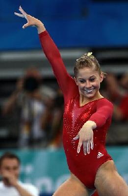 Nastia Liukin of the United States edged her compatriot Shawn Johnson to win the women's all-around after a breathtaking Olympic gymnastics competition on Friday.