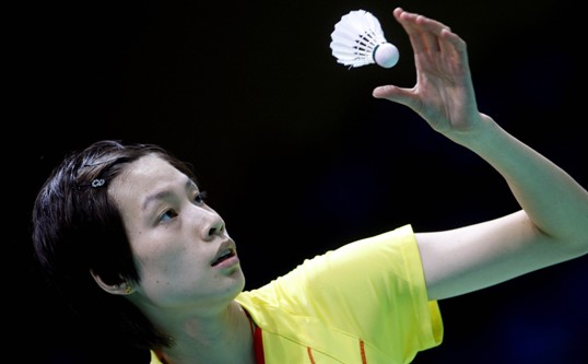Xie Xingfang from China on August 15 checks into the final game by beating her teammate Lu Lan. Xie lost the first game at 7-21 over a slow start, but she recollected herself and won the next two games with an overwhelming predominance at 21-10, 21-12. [Xinhua]