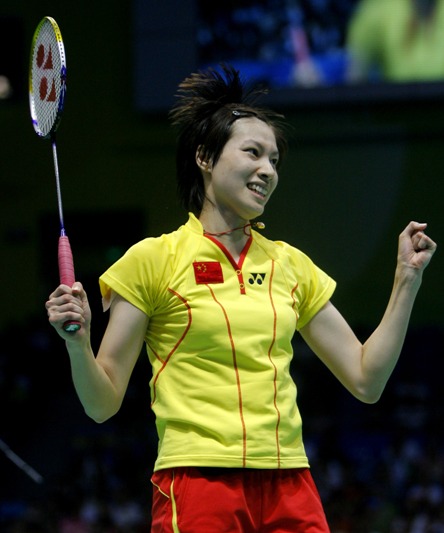 Xie Xingfang from China on August 15 checks into the final game by beating her teammate Lu Lan. Xie lost the first game at 7-21 over a slow start, but she recollected herself and won the next two games with an overwhelming predominance at 21-10, 21-12. [Xinhua]