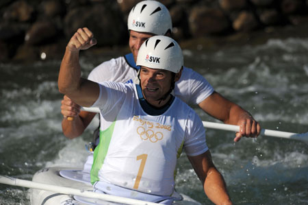 Pavol Hochschorner (front) and Peter Hochschorner of Slovakia react after finishing the canoe double (C2) men final at the Beijing Olympic Games Canoe/Kayak Slalom event in Beijing, China, Aug. 15, 2008.