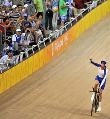 Bradley Wiggins of Great Britain celebrates at the men's individual pursuit qualifying of the Beijing 2008 Olympic cycling-track event at the Laoshan Velodrome in Beijing, China, Aug. 15, 2008. Wiggins created a new Olympic record with a total time of 4:15.031. 