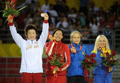 Photos: Canada's Carol Huynh wins Women's Freestyle 48kg Wrestling gold