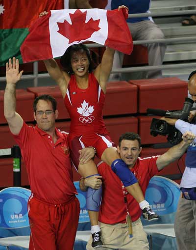 Photos: Canada's Carol Huynh wins Women's Freestyle 48kg Wrestling gold