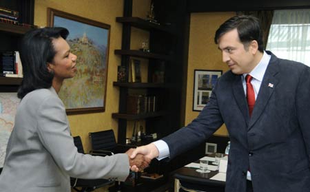 US Secretary of State Condoleezza Rice (L) and Georgia's President Mikheil Saakashvili meet in Tbilisi, August 15, 2008. Rice arrived in Georgia on Friday for talks with President Mikheil Saakashvili on formalising a French-negotiated ceasefire to the South Ossetian conflict. (Xinhua/Reuters Photo)