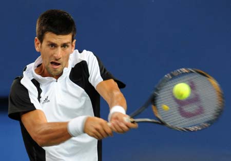 Novak Djokovic of Serbia competes in Men's Single Semifinal 2 between Novak Djokovic of Serbia and Rafael Nadal of Spain of Beijing 2008 Olympic Games tennis event at Olympic Green Tennis Center in Beijing, China, Aug. 15, 2008. (Xinhua/Xing Guangli) 