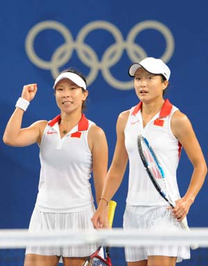 Zheng Jie and Yan Zi(R) celebrates victory after beating Russia's Kuznetsova Svetlana and Safina Dinara in women's doubles quarterfinal in Beijing on Saturday Aug. 16, 2008. Zhang Jie and Yan Zi won the match 6-3,5-7,10-8.(Xinhua/Xing Guangli)