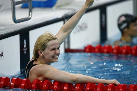 Britta Steffen of Germany celebrates during the final of women's 50m freestyle at the Beijing 2008 Olympic Games in the National Aquatics Center, also known as the Water Cube in Beijing, China, Aug. 17, 2008. Britta Steffen won the gold medal in a new olympic record with 24.06 seconds.