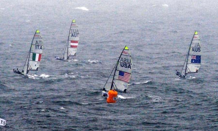 Dinghies compete during the 49er medal race at the Beijing 2008 Olympic Games sailing event at Qingdao Olympic Sailing Center in Qingdao, an-Olympic co-host city in eastern China’s Shandong Province, Aug. 17, 2008. Jonas Warrer and Martin Kirketerp Ibsen of Denmark won the gold medal. [Song Zhenping/Xinhua] 