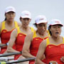 Chinese rowers stride to podium with smiles from heart