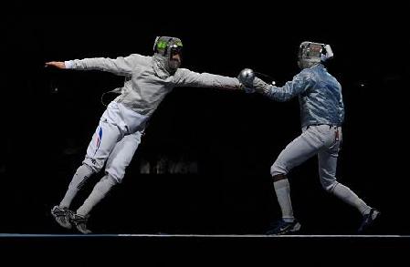France claimed the men's sabre team title at the Beijing Olympics on Sunday, beating the United States 45-37 in the final.