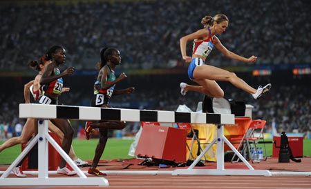 Gulnara Galkina-Samitova (R) of Russia competes in women&apos;s 3000m steeplechase final at the National Stadium, also known as the Bird&apos;s Nest, during Beijing 2008 Olympic Games in Beijing, China, Aug. 17, 2008. claimed the title of the event and broke the world record.