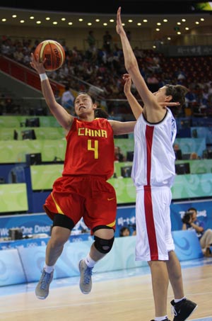 Song Xiaoyun (L) of China lays up the ball during Women's Preliminary Rnd Group B - Game 53 between China and Czech Republic at Olympic Basketball Gymnasium in Beijing, China, Aug. 17, 2008. China beat Czech 79-63. 
