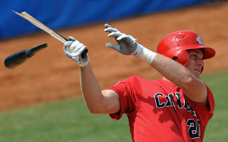 Michael Saunders of Canada breaks the bat during the match the United States VS Canada in Men's Preliminaries of the Beijing 2008 Olympic Games Baseball event in Beijing, China, Aug. 16, 2008. The United States beat Canada 5-4. [Zhang Ling/Xinhua] 