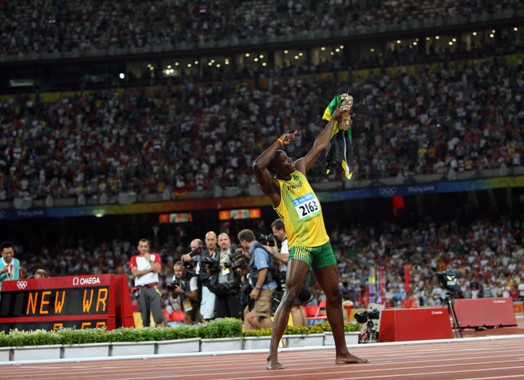 Jamaican Usain Bolt dashed to his first Olympic gold in the men's 100m, blistering a world record-breaking 9.69 seconds. The 21-year-old Bolt didn't even use all his strength in final his final strides, while slamming his chest with right palm before reaching the finish line. Bolt said, 'I came here to prove that I'm the best in the world. I just came here to win.' [Xinhua]