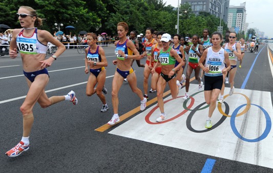 Romanian runner Constantina Tomescu added her country on August 17 a gold medal at the Beijing Olympics while Chinese Zhou Chunxiu created her country's Olympic best by getting a bronze in women's marathon. The 38-year-old Tomescu clocked 2 hours 26 minutes 44 seconds and Zhou finished in 2:27:07, or her second personal best. [Xinhua]