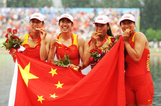 China clinched the gold medal in the Olympic event of women's quadruple sculls with a solid win on August 17, the first rowing gold medal for China in Olympic history. The Chinese crew finished the 2km race with a result of 6m16.06s some half a length ahead of the second boat. The British and German boats won the silver and bronze medals with results of 6:17.37 and 6:19.56 respectively. [Xinhua]