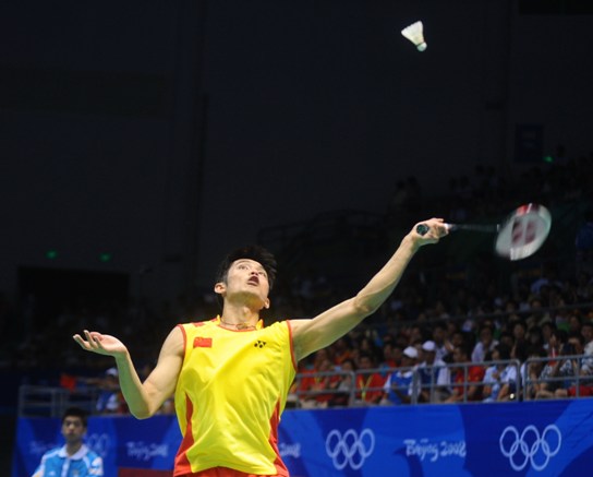 21-12, 21-8, the crushing victory over world No.2 Lee Chong Wei finally crowns Lin Dan, the top seed in men's singles at Beijing Olympic badminton tournament. [Xinhua]