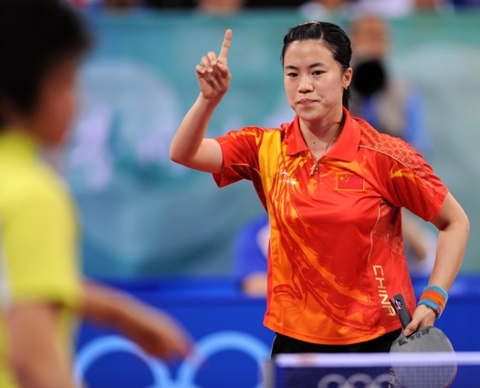 China clinches the women's Olympic team table tennis title, after fighting off a strong challenge from Singapore to win the final 3-0. It is the 17th gold medal that China has won at the Olympic table tennis competition since its national sport was introduced at the 1988 Seoul Games. [Xinhua]