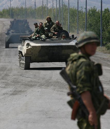 Russian troops start pullout from Georgia. [Xinhua]